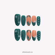 Cozy Emerald press-on nails – stiletto shape, emerald and green