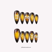 Twin Skulls press-on nails – stiletto shape, yellow and black