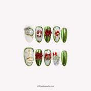 Emerald Noel press-on nails – stiletto shape, emerald and green