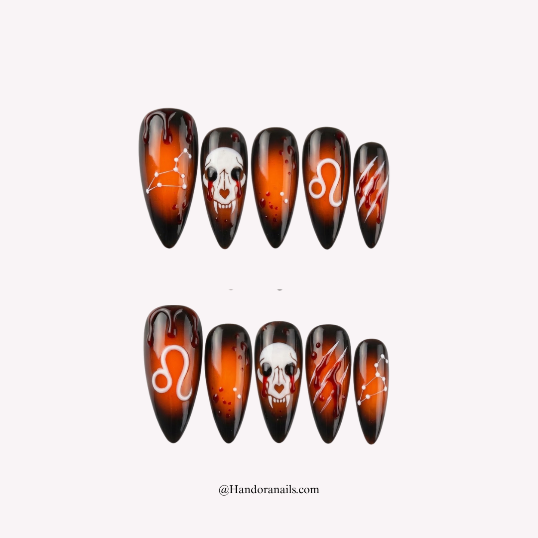 Sun Beast press-on nails – stiletto shape, orange and black