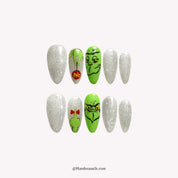 Green Sparkle press-on nails – stiletto shape, green and emerald