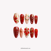 Holiday Bloom press-on nails – stiletto shape, white and green