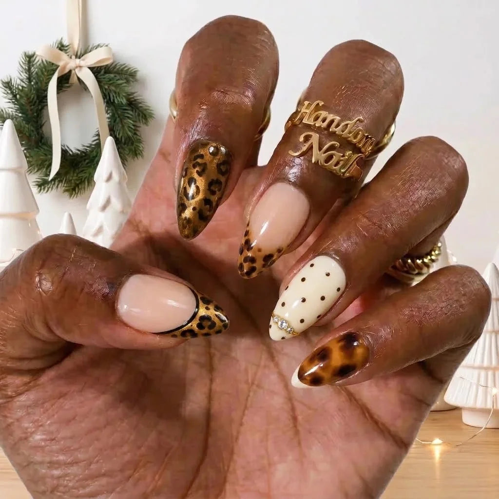Amber Prowl winter press-on nails - on hand by Handora Nails