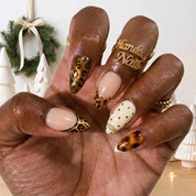 Amber Prowl winter press-on nails - on hand by Handora Nails