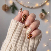 Amber Prowl winter press-on nails - on hand by Handora Nails