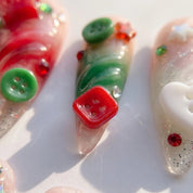Button Knit christmas press-on nails – close-up by Handora Nails