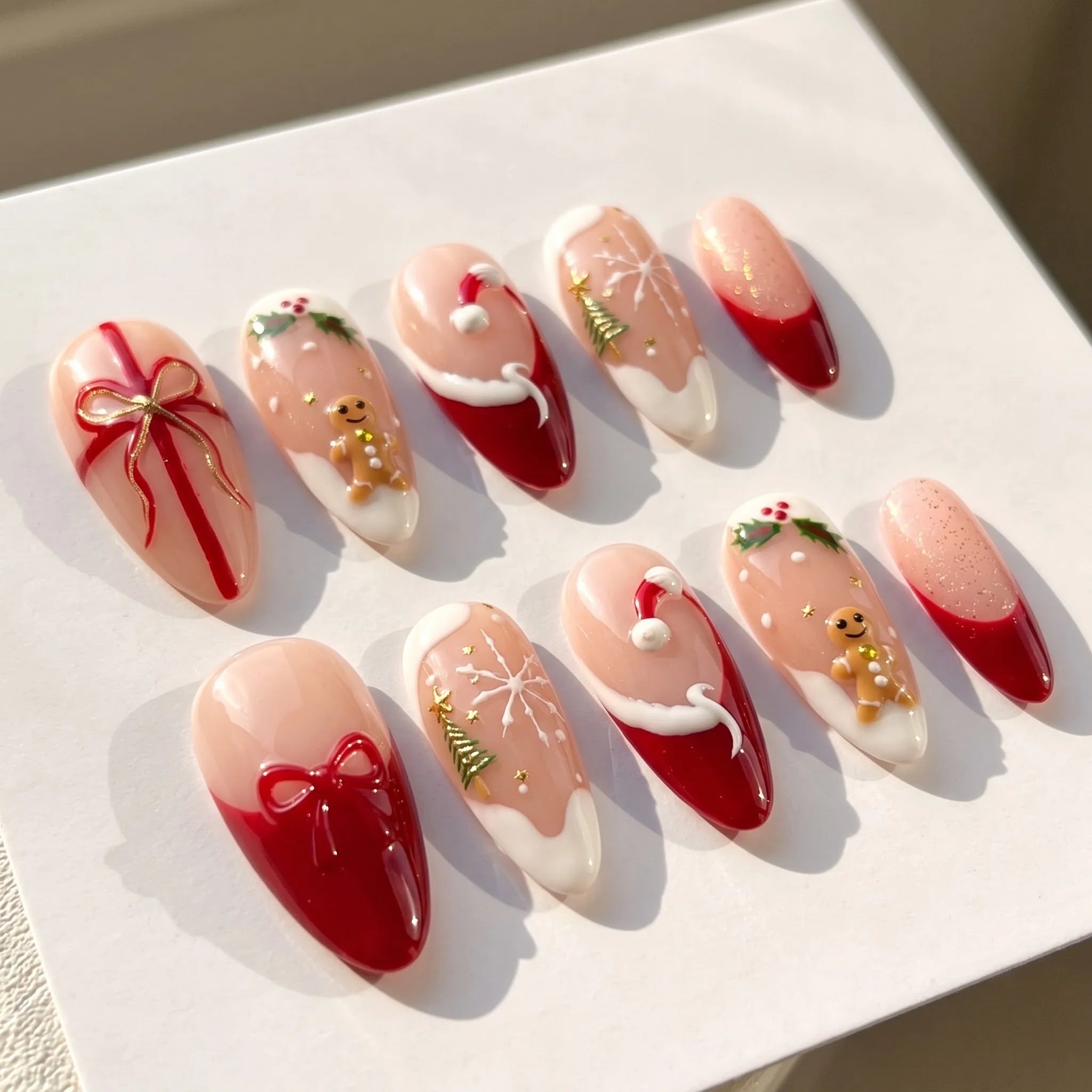 Christmas Morning Gingerbread press-on nails – flat lay by Handora Nails