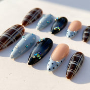 Frost Plaid Christmas press-on nails – flat lay by Handora Nails