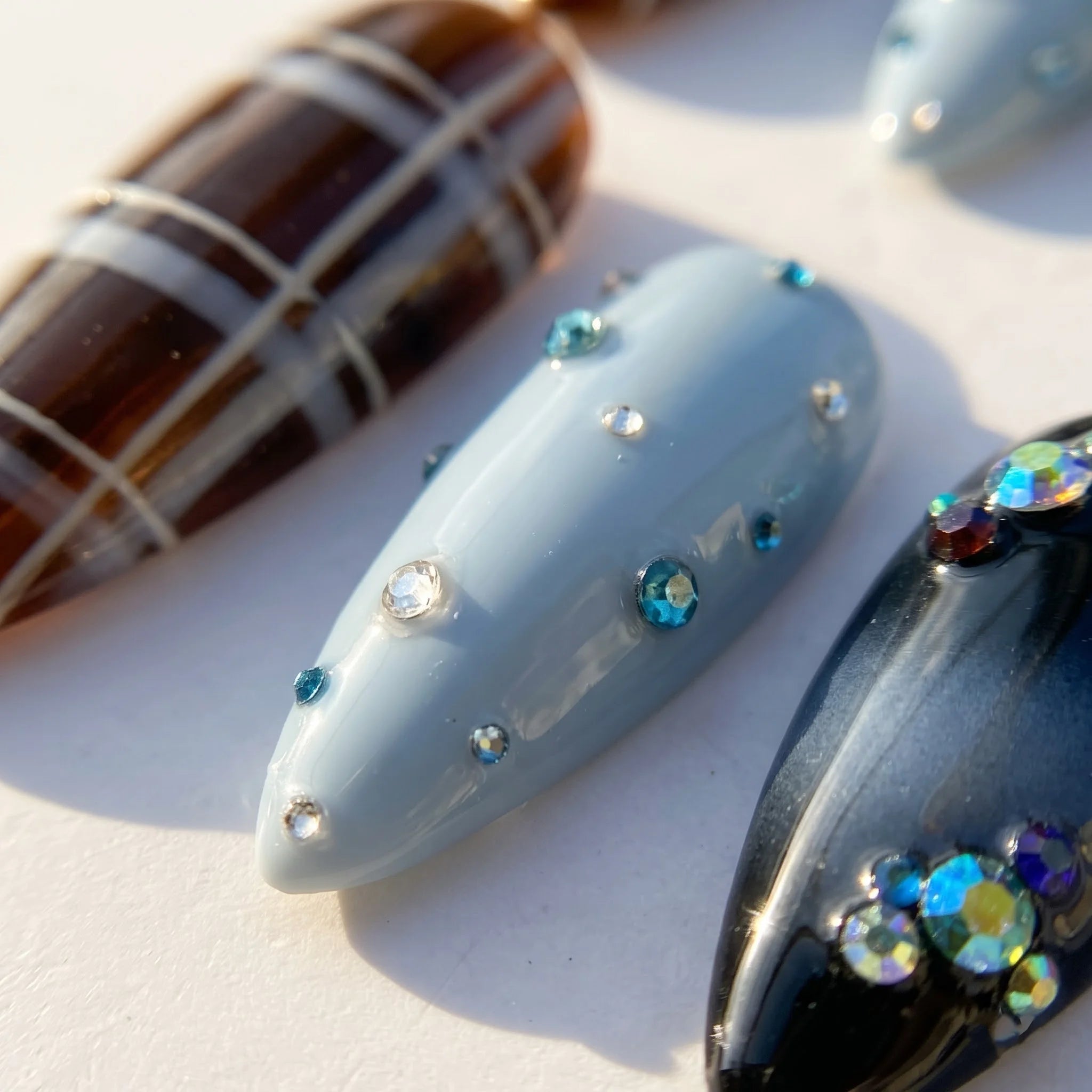 Frost Plaid Christmas press-on nails – close-up by Handora Nails