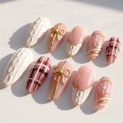 Gift Wrapped Christmas Sweater press-on nails – flat lay by Handora Nails