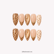 Golden Lynx winter press-on nails - white background by Handora Nails