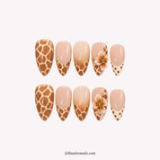 Honey Giraffe winter press-on nails - white background by Handora Nails