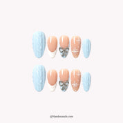 Ice Knit press-on nails – almond shape, silver and white