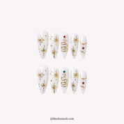 Ivory Gold Christmas press-on nails - white background by Handora Nails