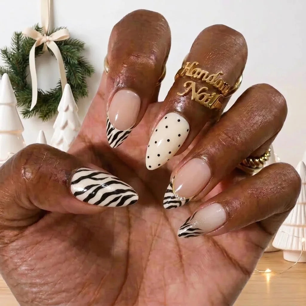 Ivory Zebra winter press-on nails - on hand by Handora Nails