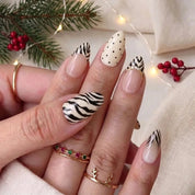 Ivory Zebra winter press-on nails - on hand by Handora Nails