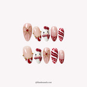 Merry Kitty Candy Cane press-on nails – white background by Handora Nails