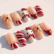 Merry Kitty Candy Cane press-on nails – flat lay by Handora Nails