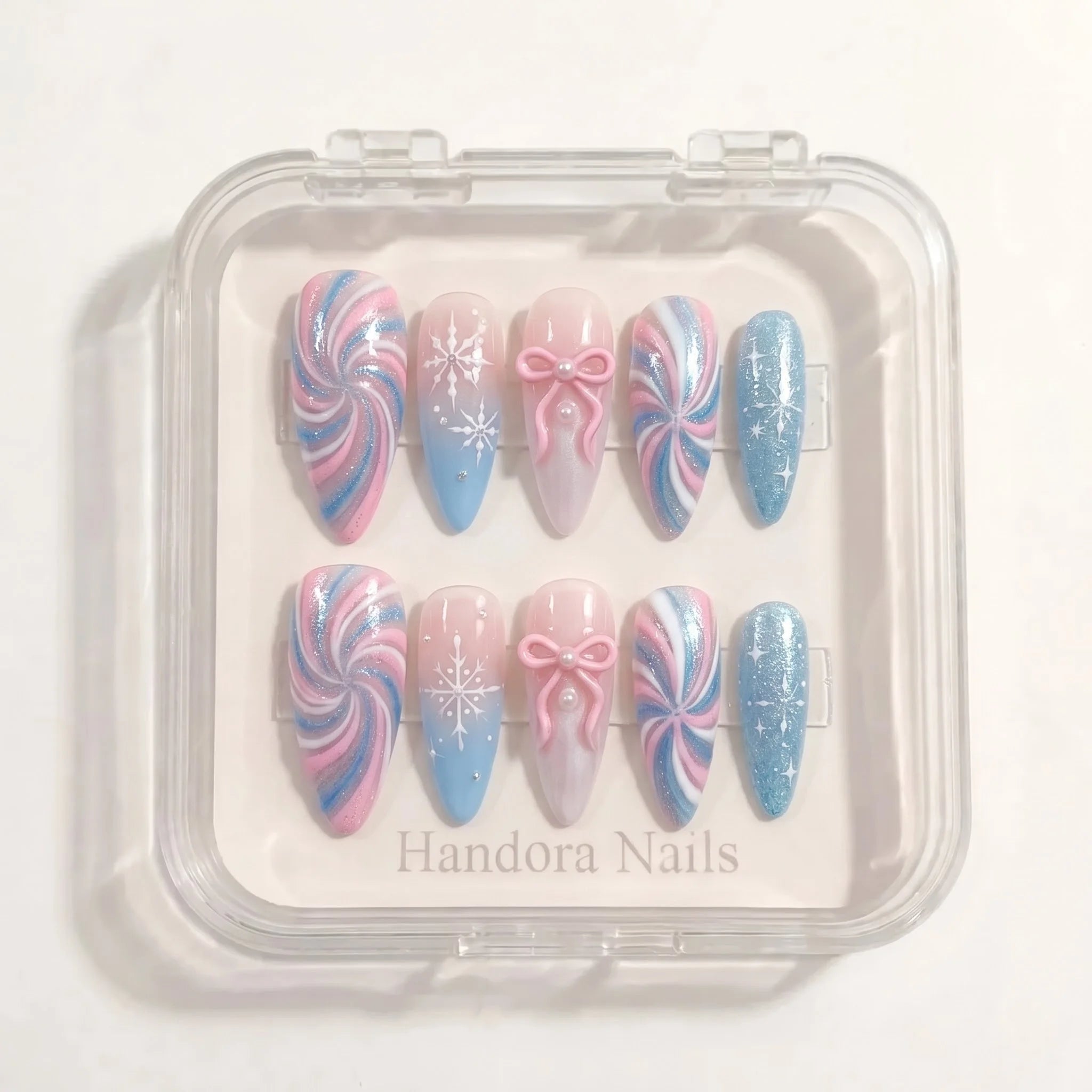 Pastel Snowflake winter press-on nails – white background by Handora Nails