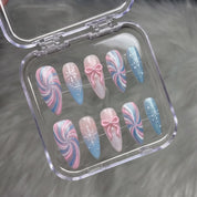 Pastel Snowflake winter press-on nails – flat lay and packaging by Handora Nails
