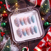 Pastel Snowflake winter press-on nails – flat lay and packaging by Handora Nails