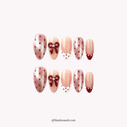 Polka Bow press-on nails – almond shape, burgundy and white