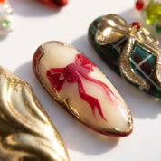 Royal Xmas christmas press-on nails – close-up by Handora Nails