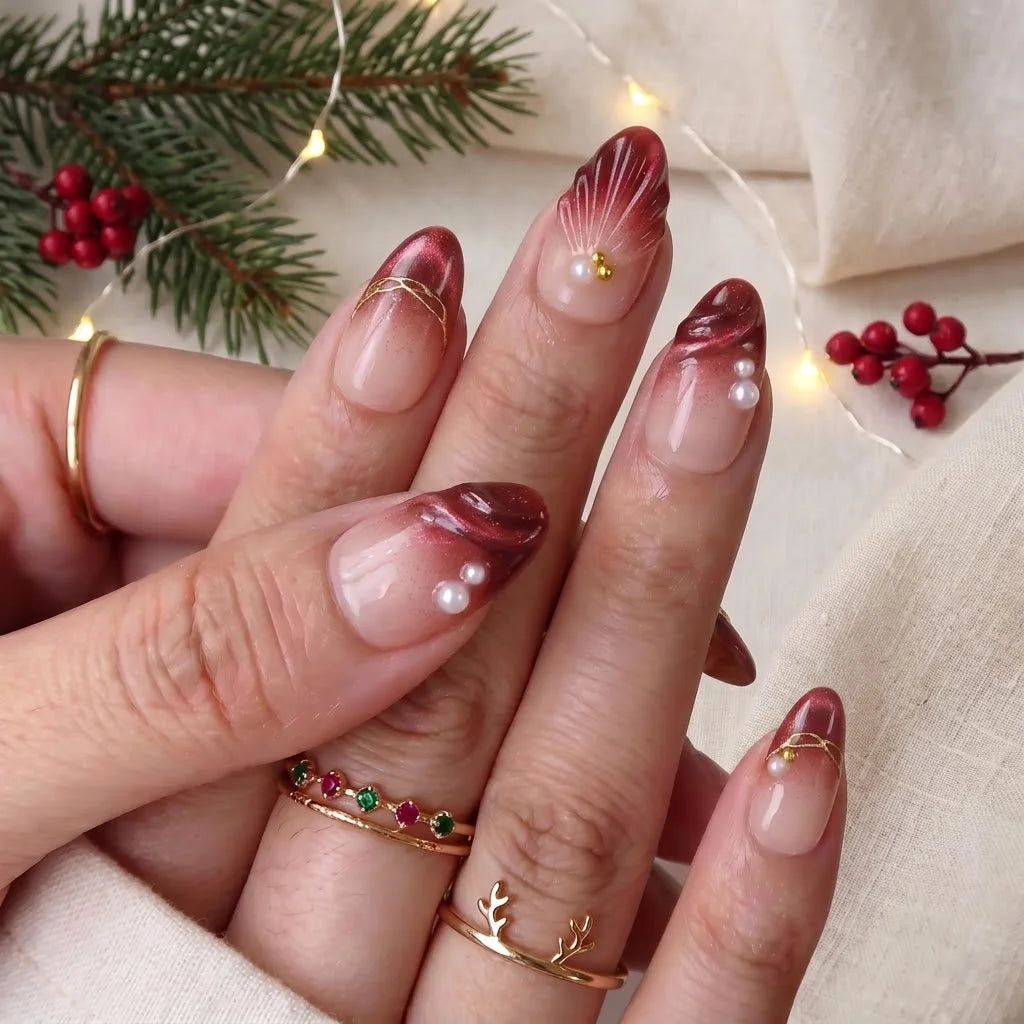 Ruby Tide Christmas press-on nails - on hand by Handora Nails