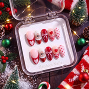 Santa Pop christmas press-on nails – flat lay and packaging by Handora Nails