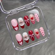 Santa Pop christmas press-on nails – flat lay and packaging by Handora Nails