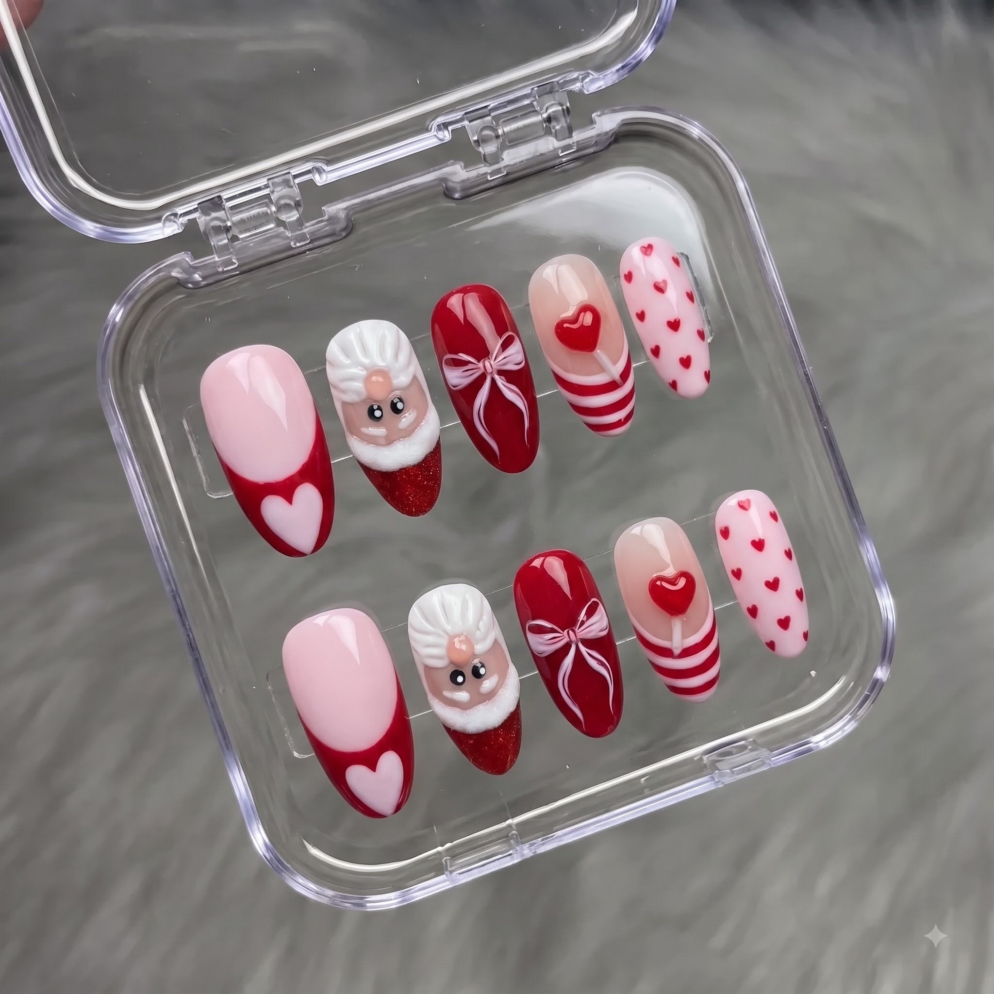 Santa Pop christmas press-on nails – flat lay and packaging by Handora Nails