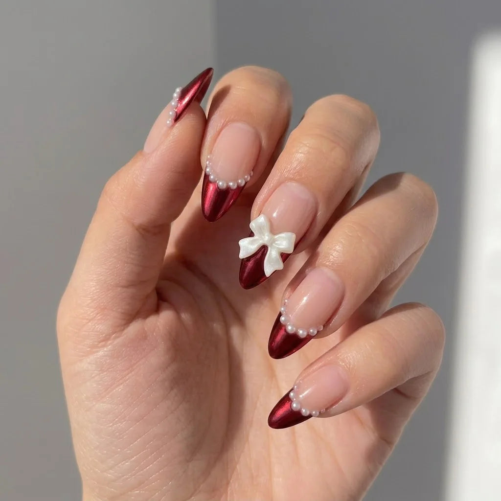 Santa's Bow Chrome French press-on nails – on hand by Handora Nails