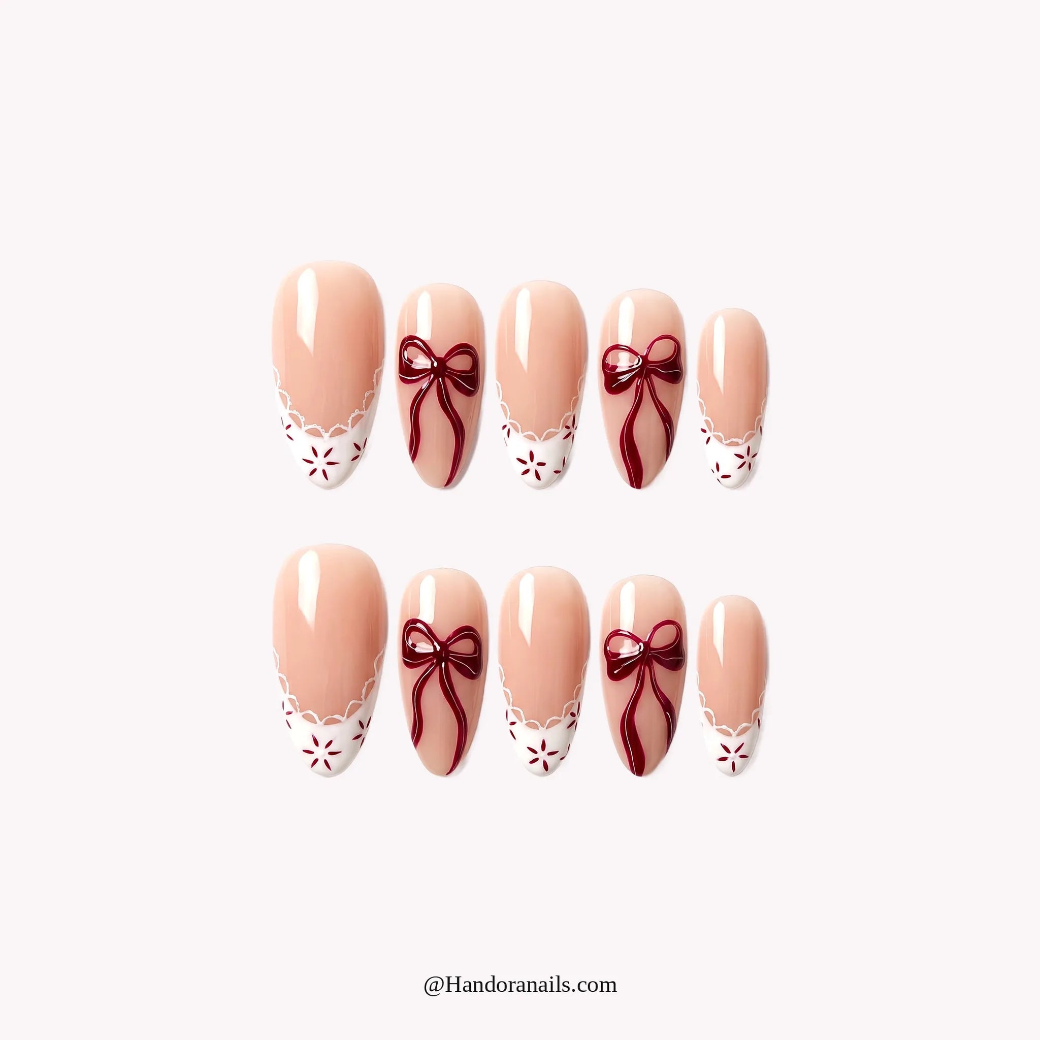 Snowbound Bow press-on nails – almond shape, burgundy and white
