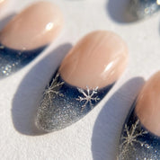 Winter Midnight snowflake press-on nails – close-up by Handora Nails