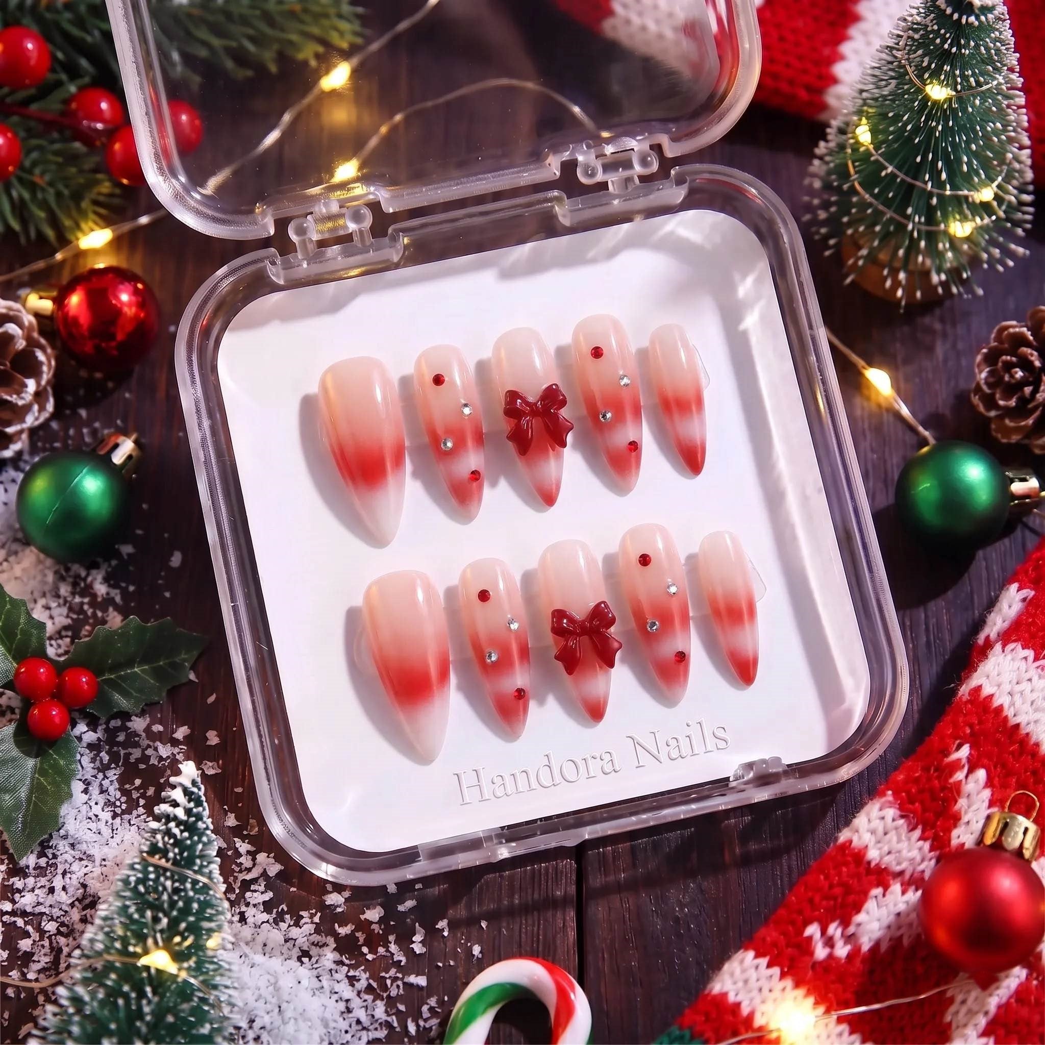 Woolen Bow christmas press-on nails – flat lay and packaging by Handora Nails