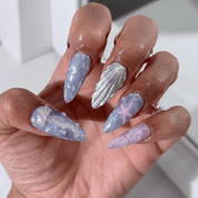Aetheric Tide press-on nails worn on hand – almond shape by Handora