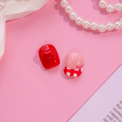 Amour Gingham press-on nails worn on hand – almond shape by Handora