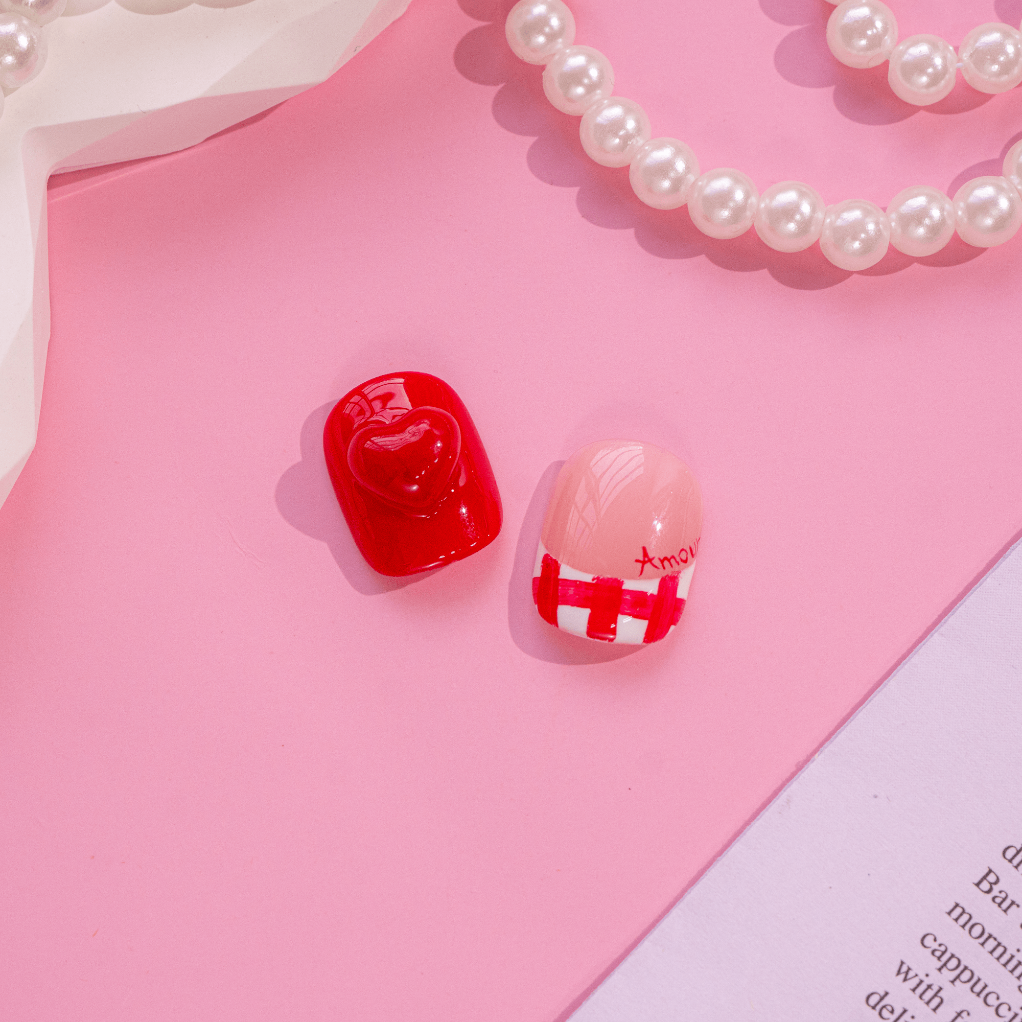 Amour Gingham press-on nails worn on hand – almond shape by Handora