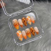 Aperol Spritz press-on nails by Handora