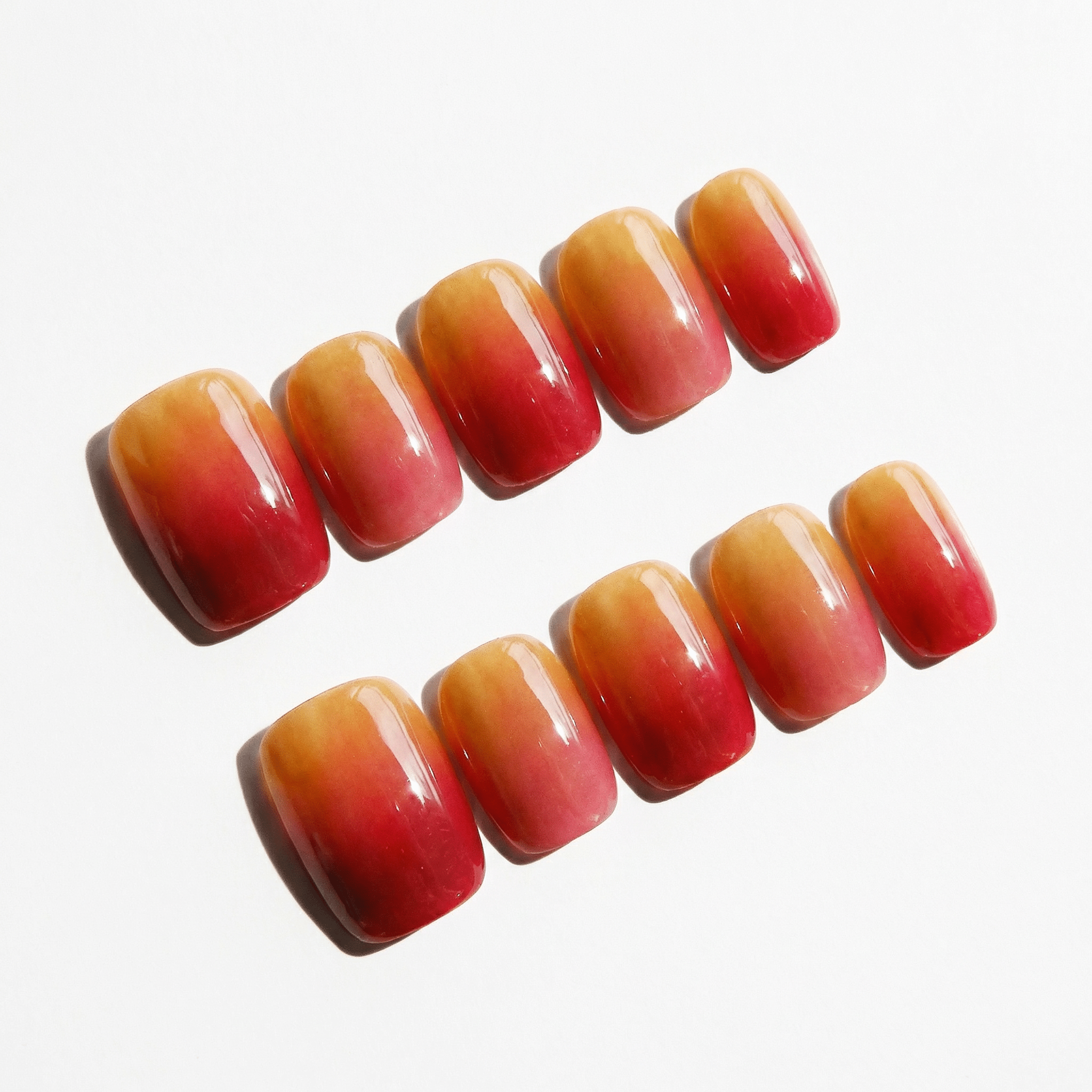 Apple Blush press-on nails – hand-painted reusable gel set by Handora