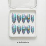Aquarius Aura press-on nails worn on hand – almond shape by Handora
