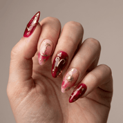 Aries Radiant press-on nails – hand-painted reusable gel set by Handora