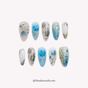 Azure Cosmo blue floral press-on nails by Handora