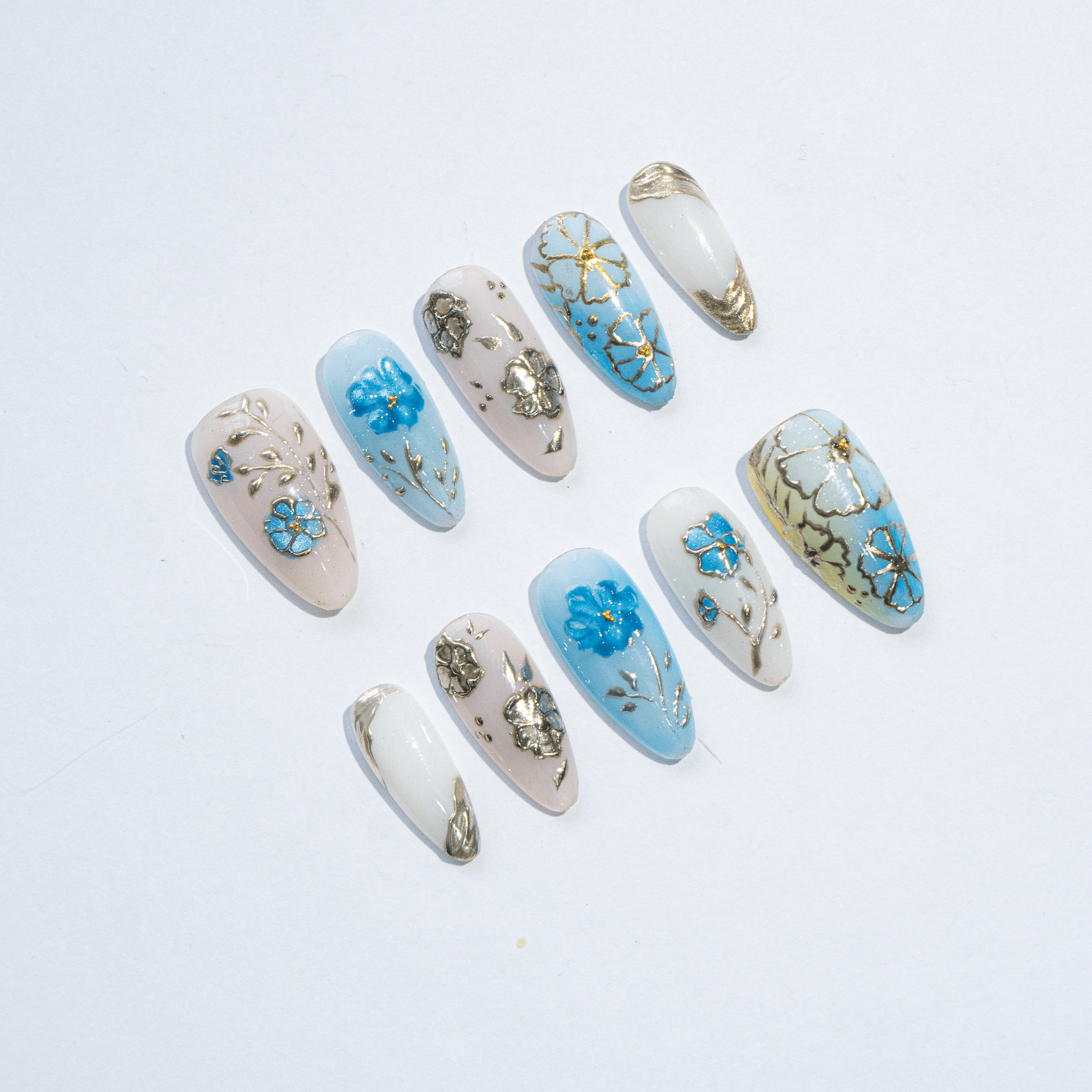 Azure Cosmo floral nail design – handmade press-on nails by Handora