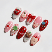 Beary Picnic press-on nails worn on hand – almond shape by Handora