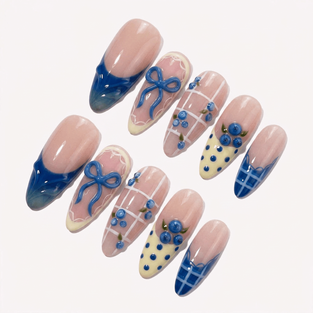 Berry Bows press-on nails worn on hand – almond shape by Handora