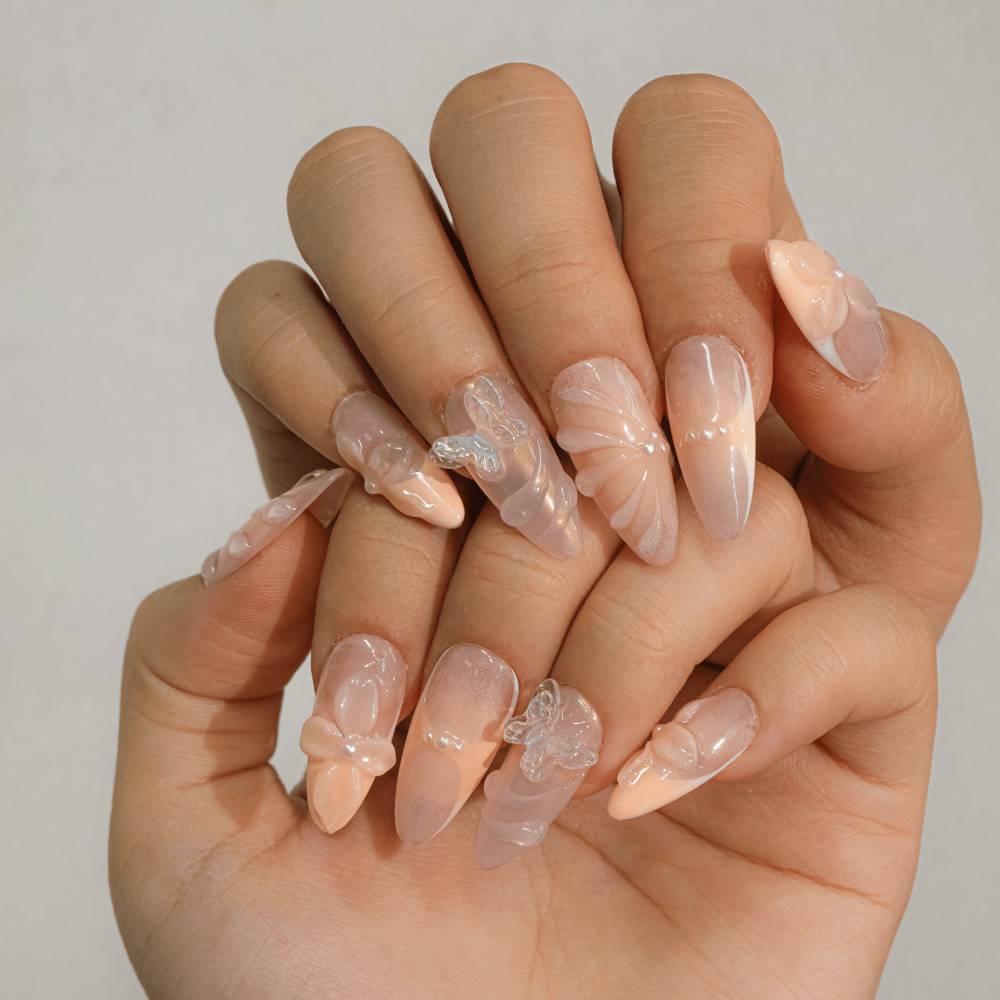 Blossom Coquette press-on nails – hand-painted reusable gel set by Handora