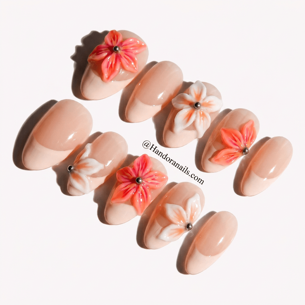 Blossom French press-on nails worn on hand – almond shape by Handora