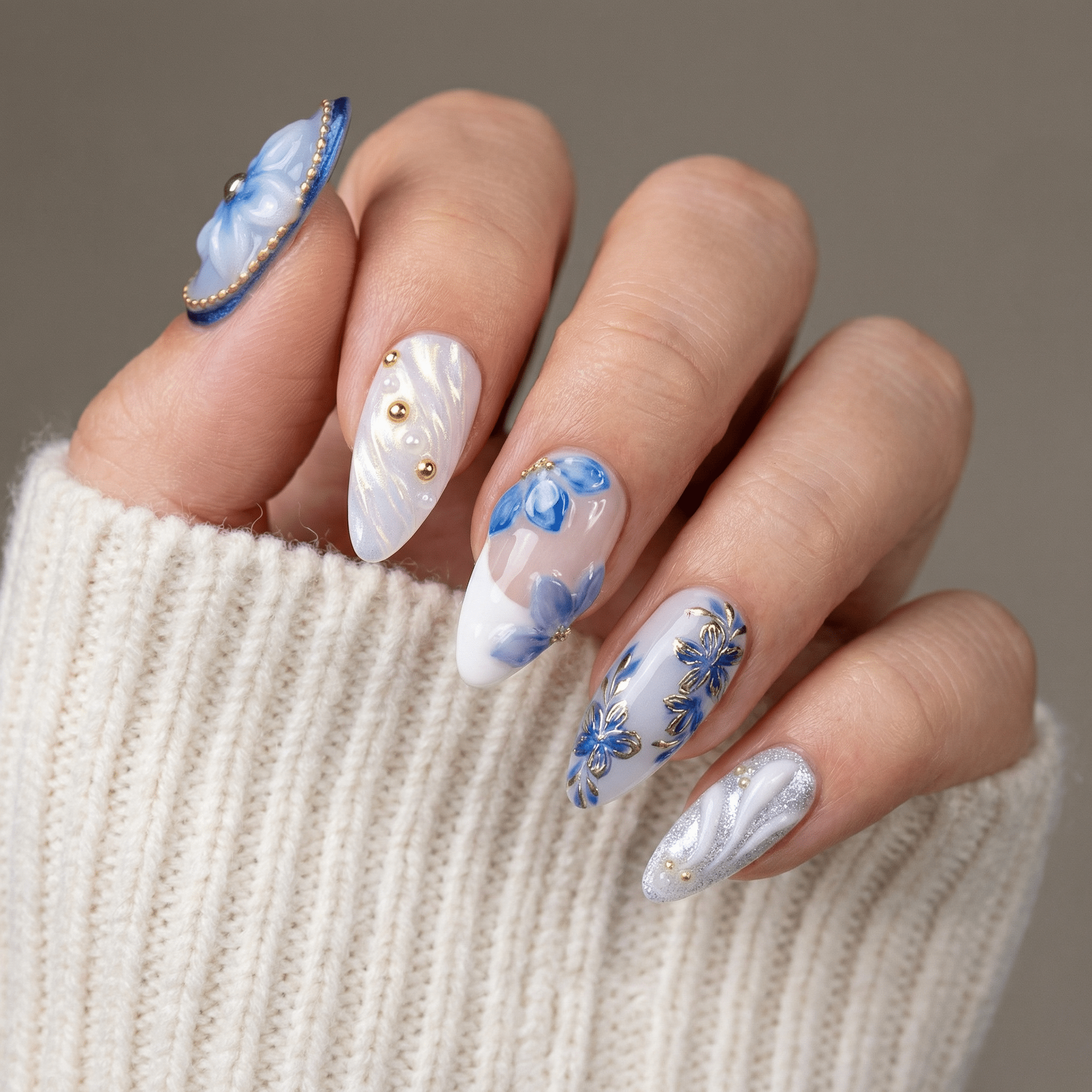 Blue Blossom press-on nails – hand-painted reusable gel set by Handora