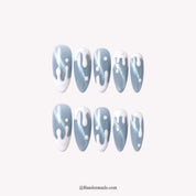 Blue Frost Christmas press-on nails - white background with Handora Nails watermark